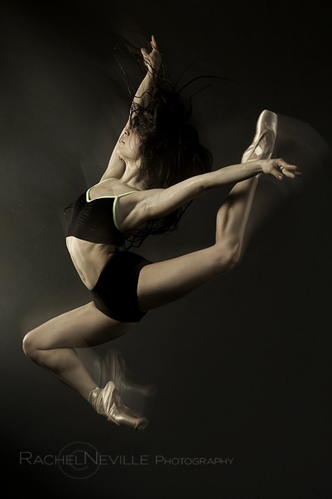 dancer jumping two piece leotard black