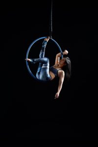 studio photos aerial hoop black background blue