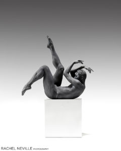 Fine art nude photograph of male dancer Nikolas Chen on box in black and white by Rachel Neville Photography
